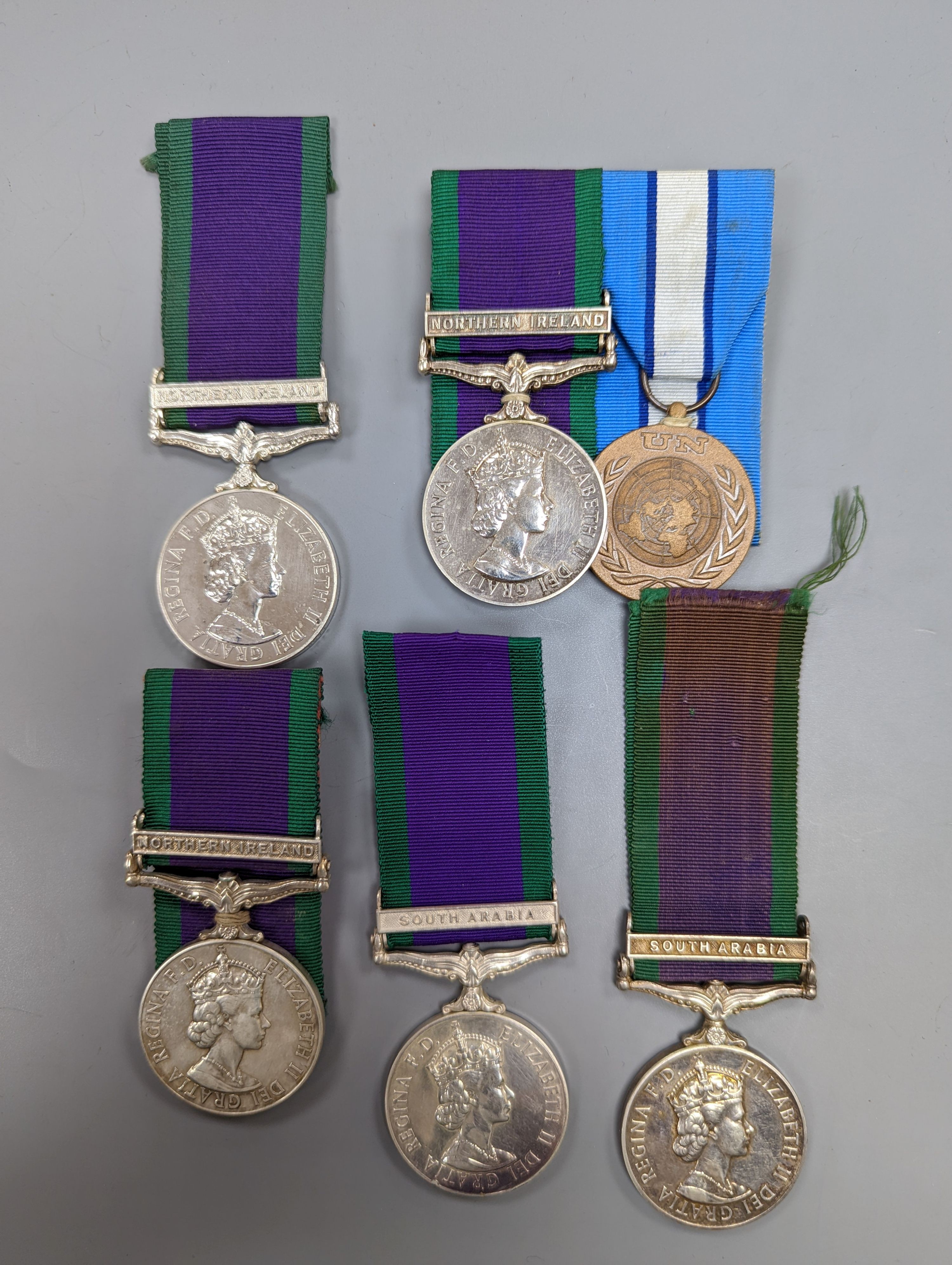 Five QEII GSM, three with a Northern Island clasp (one with UN medal), and two with South Arabia clasps